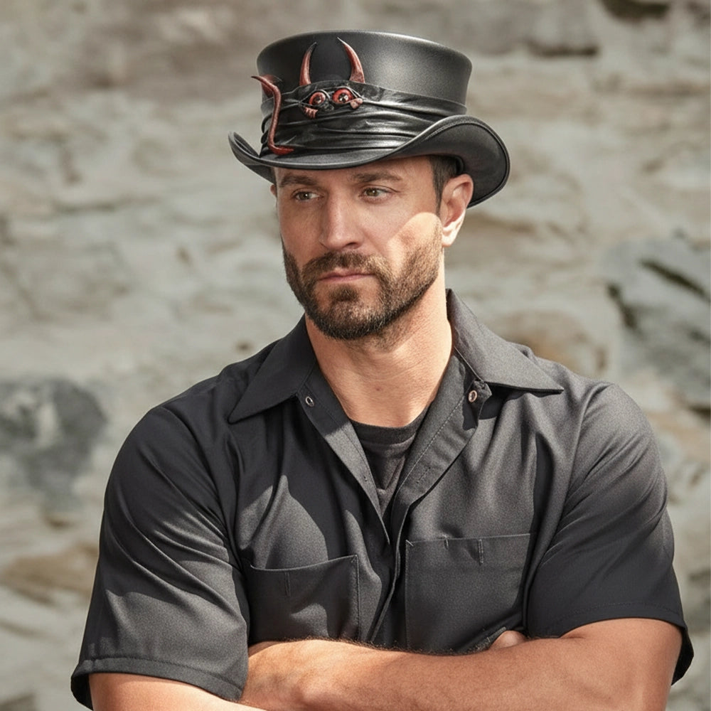 Man wearing a black leather hat with decorative elements against a stone wall background
