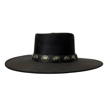 A black wide-brimmed cowboy hat with a black band decorated with silver-toned conchos and oval medallions, shown against a plain white background.