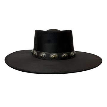 A black wide-brimmed cowboy hat with a decorative band featuring silver and gold-toned conchos, shown against a plain white background.