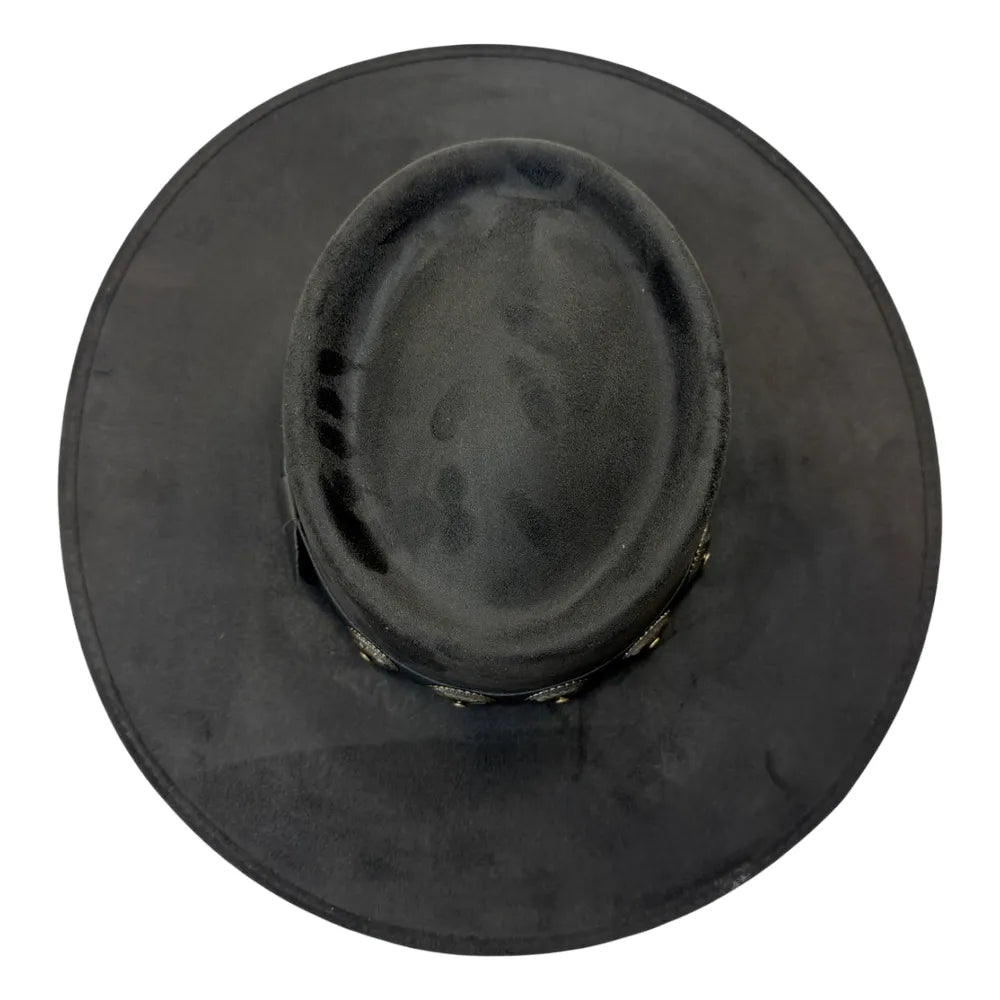A black wide-brim hat photographed from directly above on a plain white background.