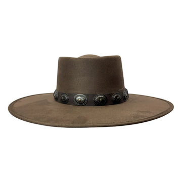 A brown wide-brimmed cowboy hat with a dark band decorated with silver-toned conchos, shown against a plain white background.