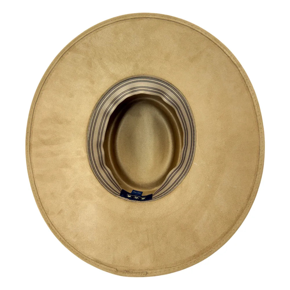 A top-down view of a wide-brimmed cowboy hat in a light tan suede-like material, showing the striped inner band and a small blue brand tag.