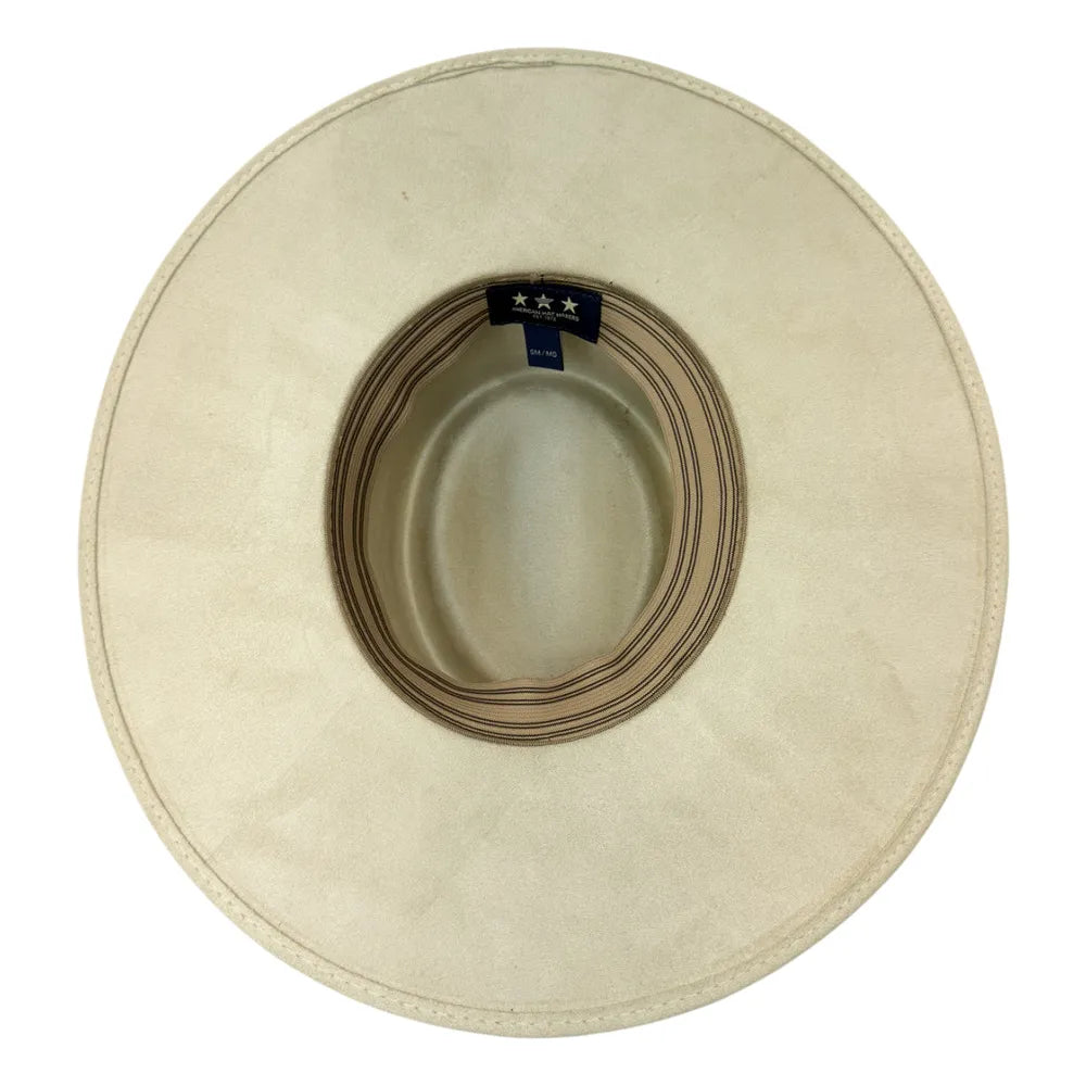 A top-down view of a light beige wide-brimmed hat, showing the inner crown with a striped band and a small black label with three white stars.