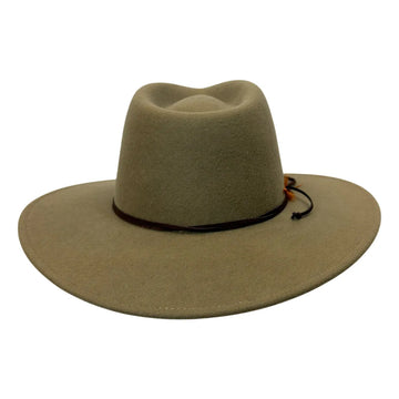 A wide-brimmed felt cowboy hat in a muted khaki-tan color, featuring a dark band around the crown and a small orange-brown decorative accent, shown against a plain white background.