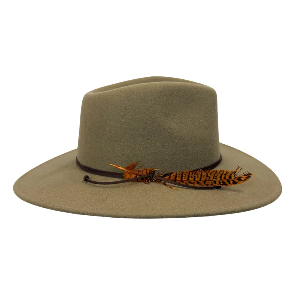 A wide-brimmed felt hat in a muted olive-tan color, featuring a dark band and a decorative brown and orange feather accent on the brim, set against a plain white background.