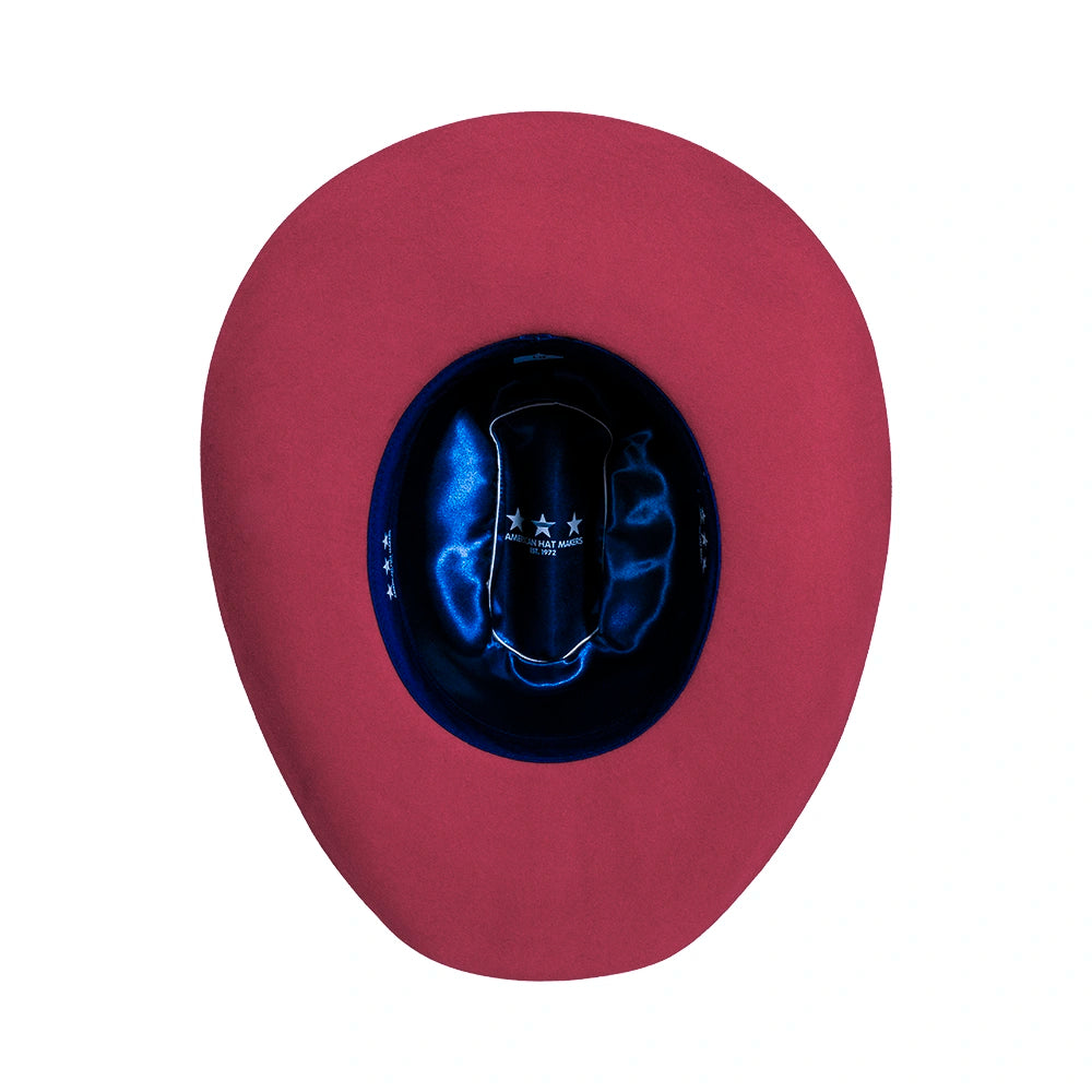 Maroon cowboy hat with a blue interior on a white background
