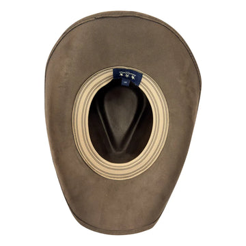 A brown cowboy hat viewed from the inside, showing a wide beige striped brim opening and a small blue interior label.
