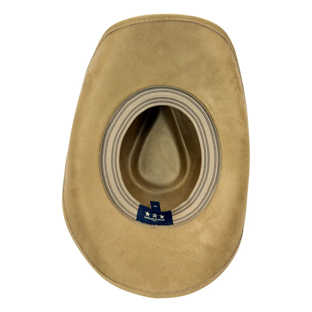 A tan suede cowboy hat viewed from directly above, showing the interior crown and a blue brand tag near the base.
