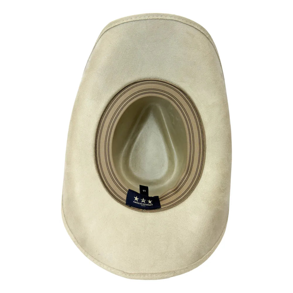 A light beige cowboy hat viewed from the top, showing the interior crown and a small black brand tag near the base.