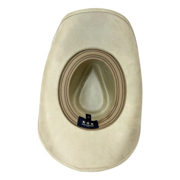 A light beige cowboy hat viewed from the top, showing the interior crown and a small black brand tag near the base.