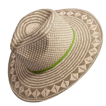 Woven straw hat with a green band on a white background