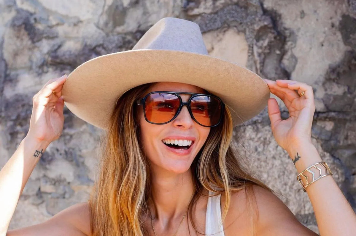 Woman posing with the Flipped brim Fedora by American Hat Makers